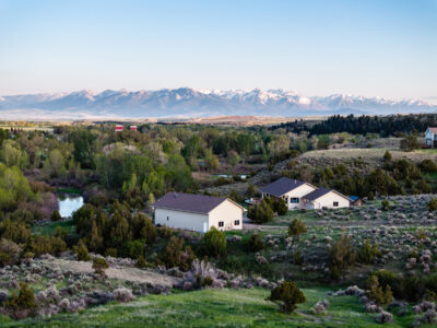 147 O’Halloran Rd, aerial view of house, shop and mountains, primary photo