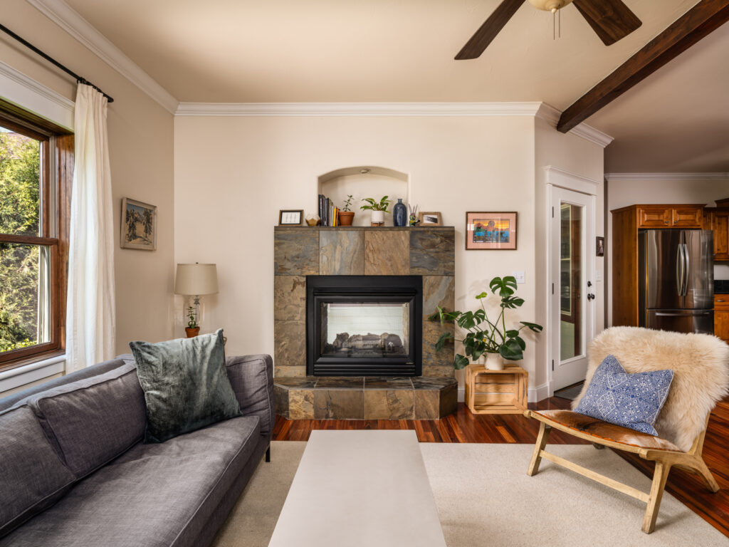 243 Ferguson, Unit 1, living room with dual side fireplace