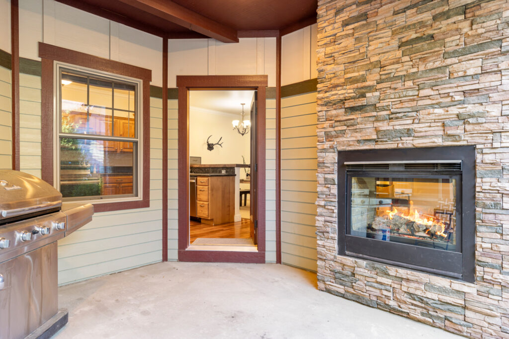243 N Ferguson, patio with entry door and fireplace