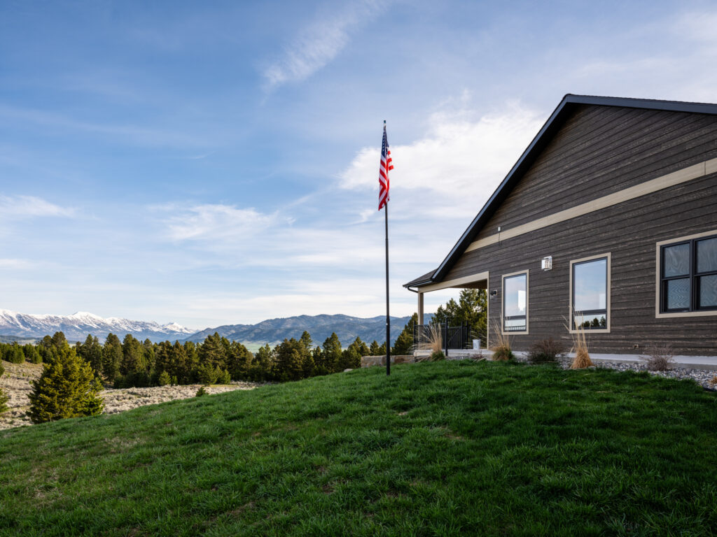 449 Minni Hall, exterior view of north with flag