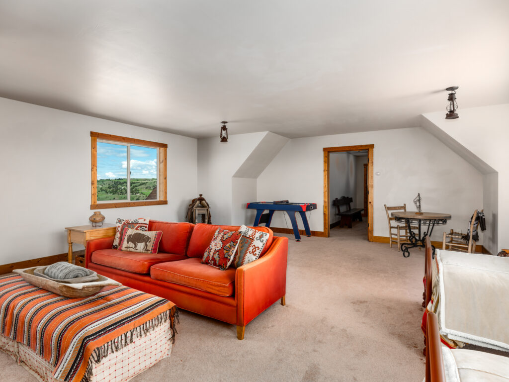 935 Bates Rd, bonus room couch