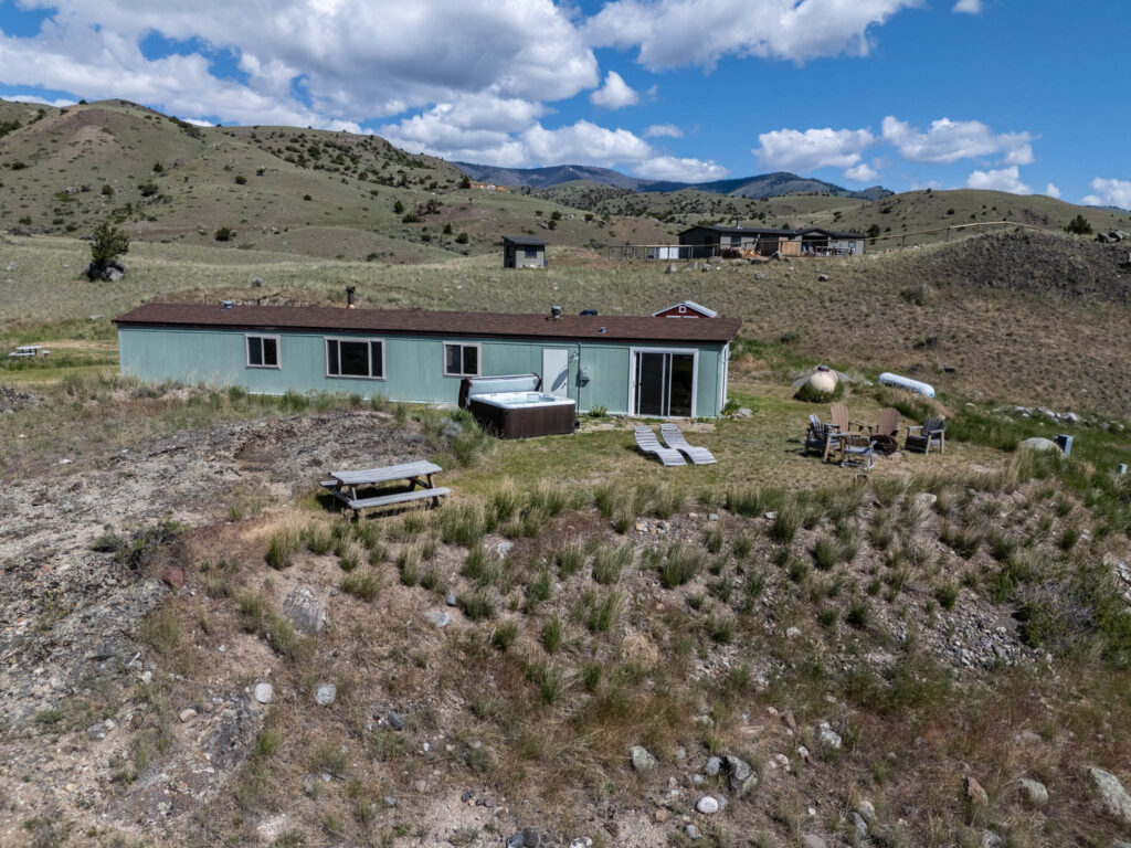 65 Arcturus, aerial view with hills