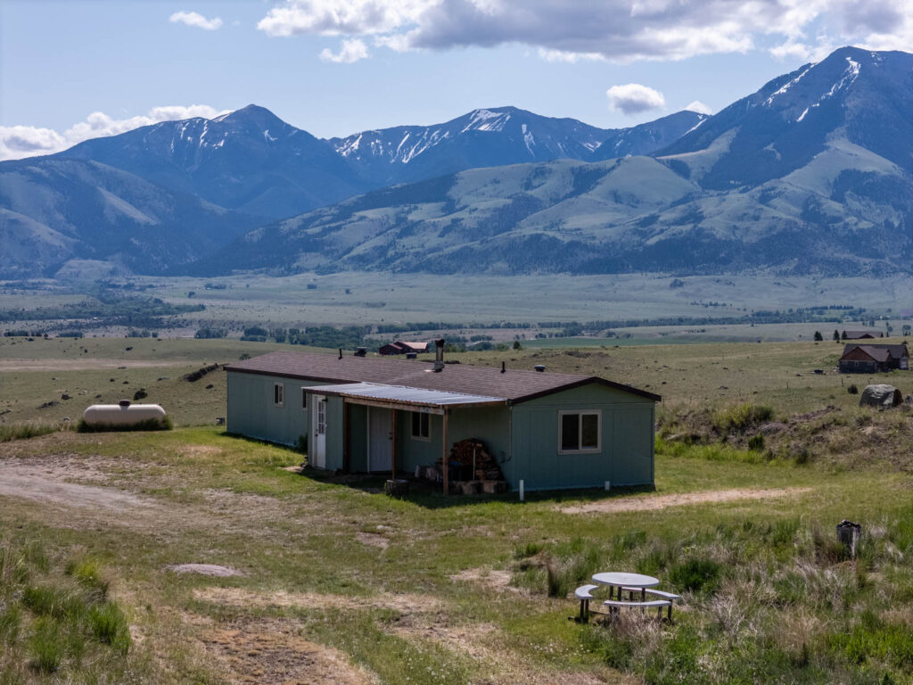 65 Arcturus, aerial view with mountains