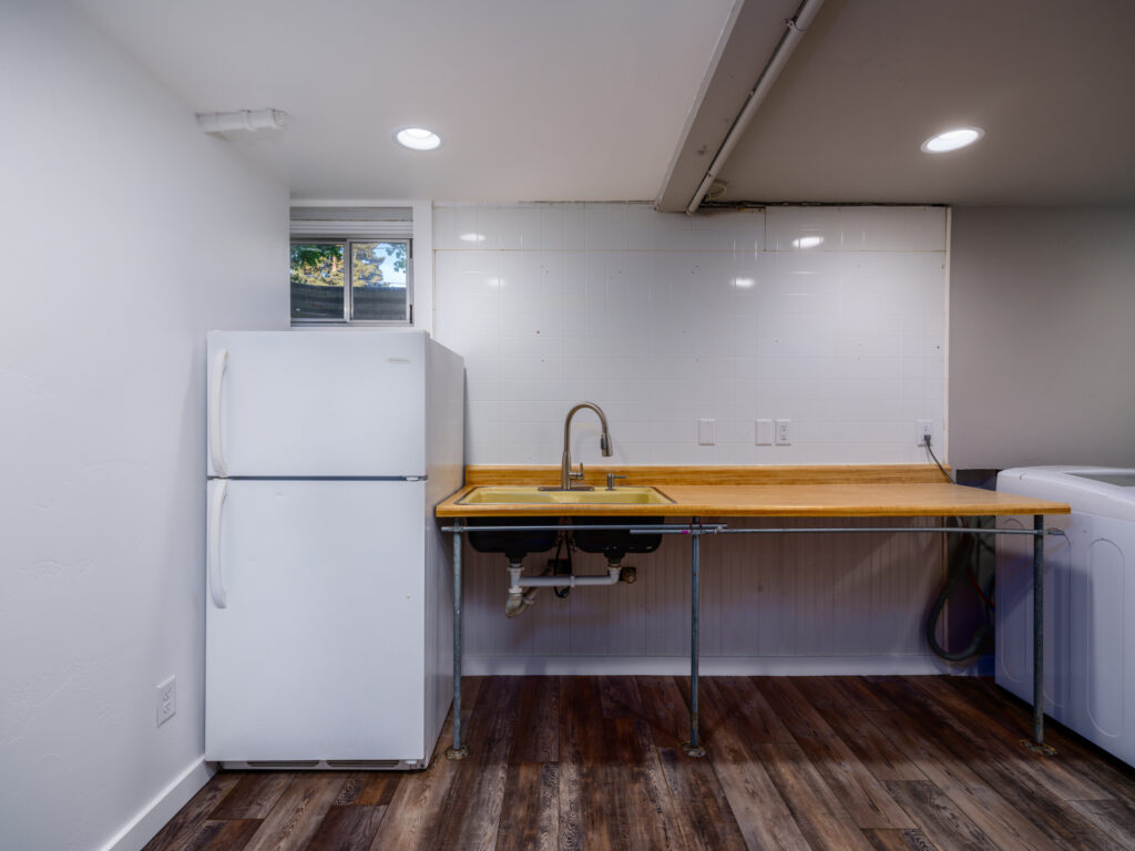701 S 14th, downstairs laundry room, sink, kitchenette