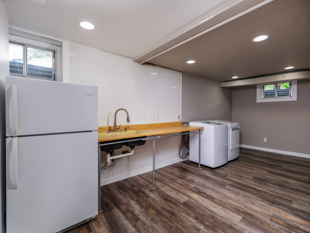 701 S 14th, downstairs laundry room, sink, kitchenette