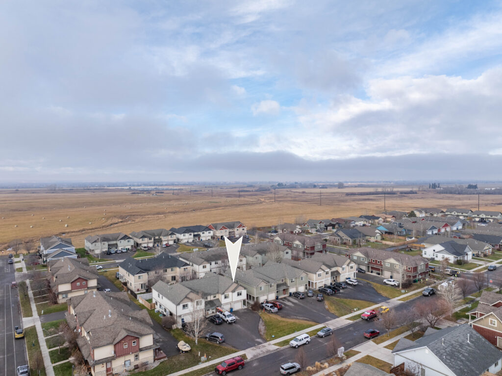 935 Forestglen Dr, Unit D - aerial with field and arrow to unit